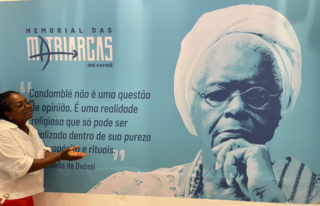 A woman visiting a candomble memorial in Salvador da Bahia